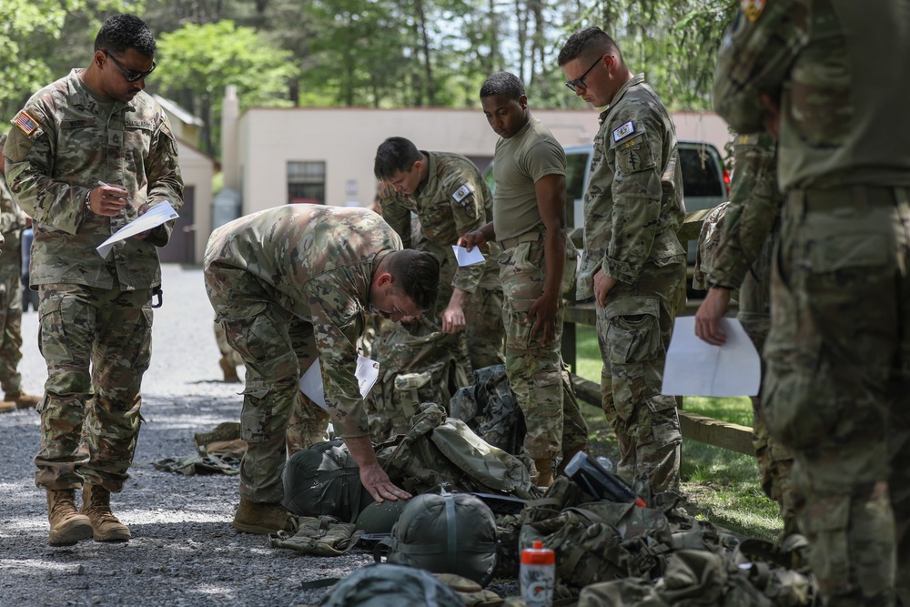 Region 2 Best Warrior Competitors' Rucksacks Get Inspected R2BWC24