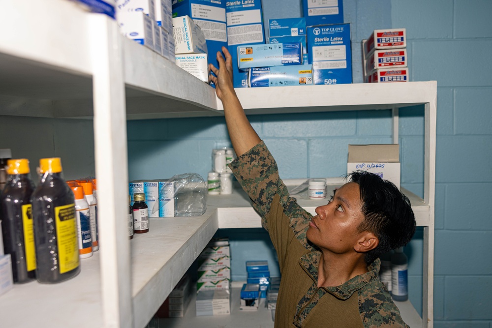 MRF-D 24.3: U.S. Navy, PNGDF medical personnel organize medical supplies