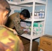MRF-D 24.3: U.S. Navy, PNGDF medical personnel organize medical supplies
