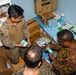 MRF-D 24.3: U.S. Navy, PNGDF medical personnel organize medical supplies