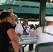 Sailors and Marines play domino’s at Domino Park in Miami during Miami Fleet Week, May 8, 2024.