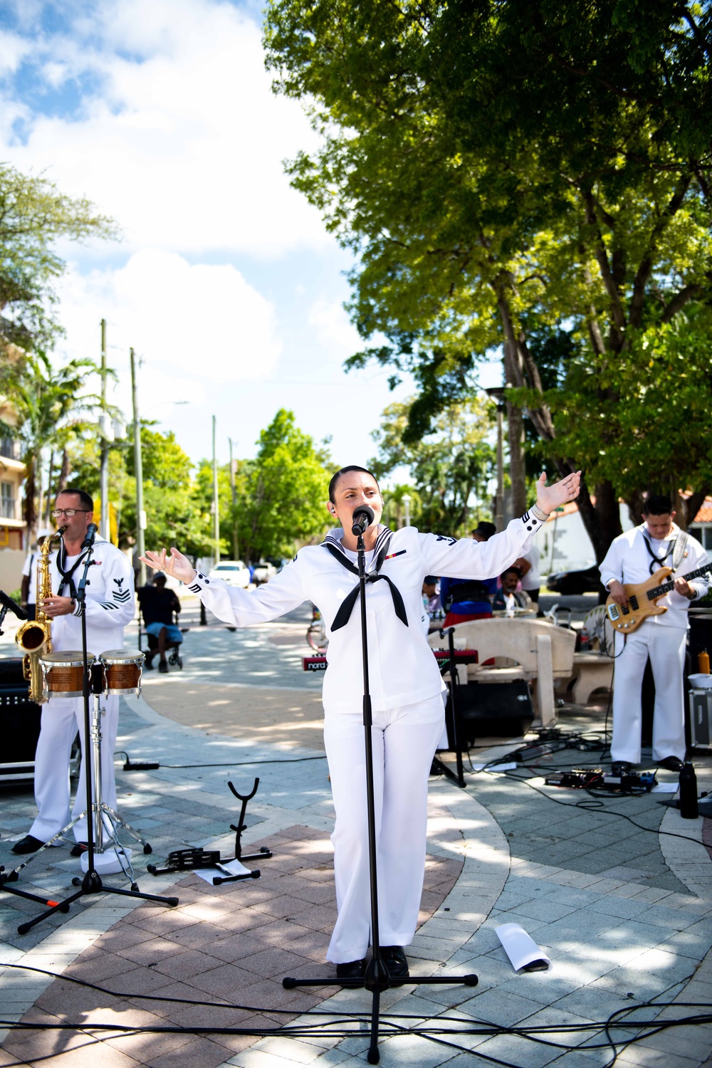 U.S. Navy Musician 3rd Class Bernadette Rocks, from Tannersville, N.J., assigned Navy Band Southeast, performs for a crowd in Domino Park during Fleet Week Miami, May 8, 2024.