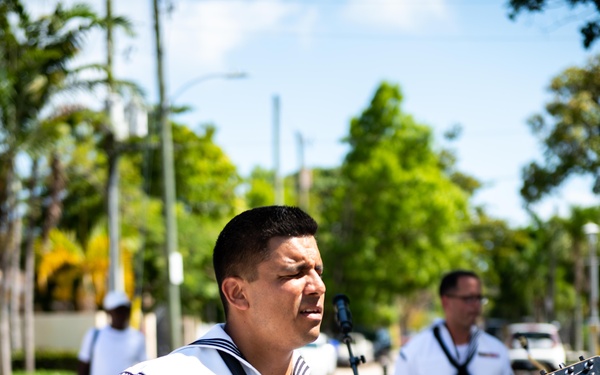 MIAMI - (May 8, 2024) U.S. Navy Musician 2nd Class Jorge Cabrera, from Los Angeles, assigned to Navy Band Southeast, plays the guitar during a public concert in Domino Park, Miami during Fleet Week Miami May 8, 2024.