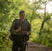 Pennsylvania Army National Guard Specialist rucks during Region 2 Best Warrior Competition