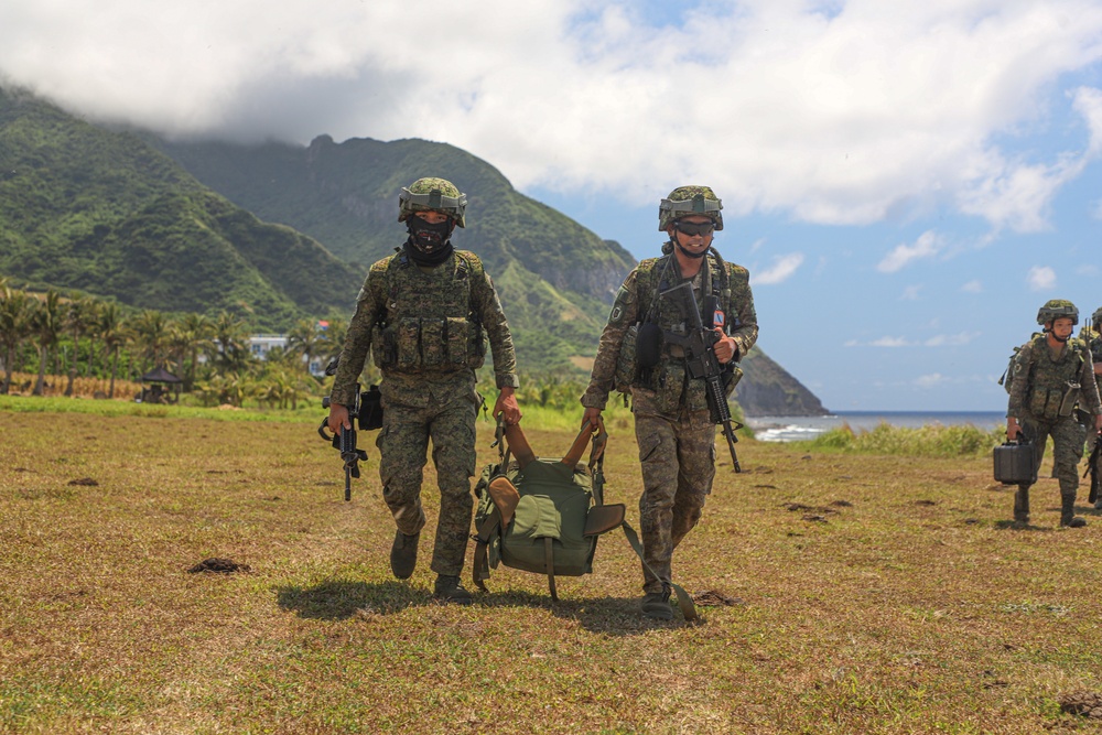 Balikatan 24: 2nd Battalion, 27th Infantry Regiment, 3rd Infantry Brigade Combat Team, 25th Infantry Division pulls security with soldiers from the Philippine Army, 7th Infantry Division