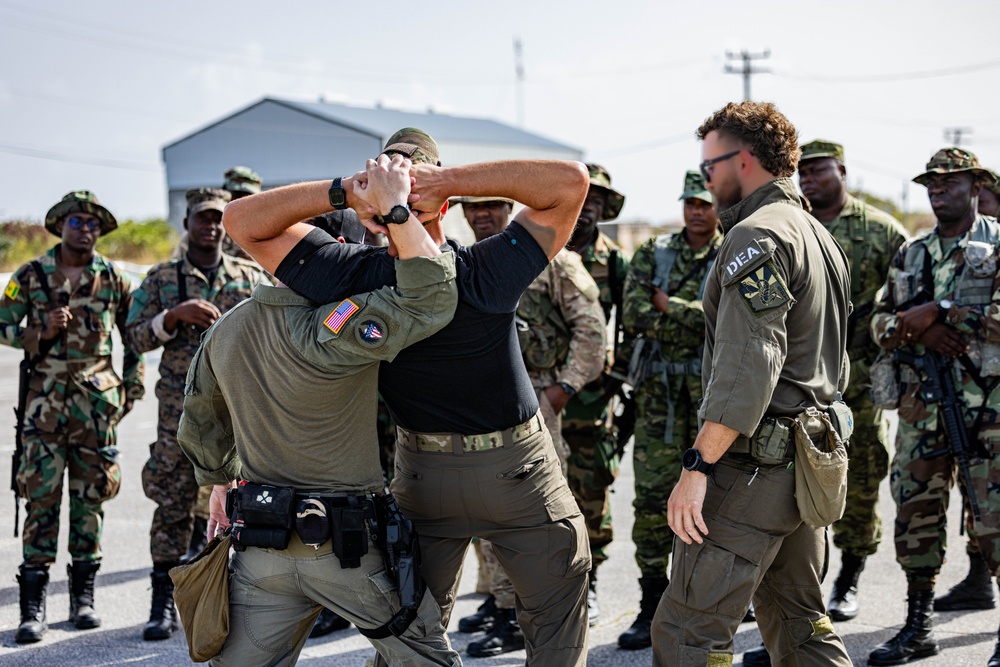 U.S. Drug Enforcement Agency Special Response Team teach investigative techniques and detainee operations at TRADEWINDS 24
