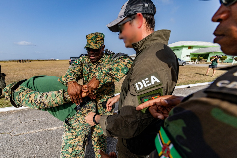 U.S. Drug Enforcement Agency Special Response Team teach investigative techniques and detainee operations at TRADEWINDS 24