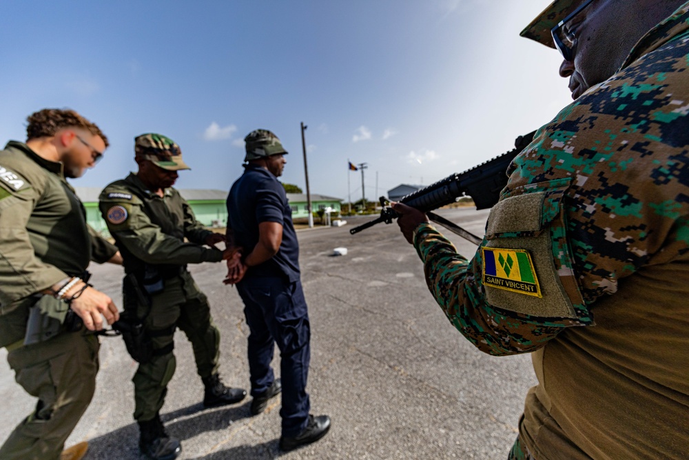 U.S. Drug Enforcement Agency Special Response Team teach investigative techniques and detainee operations at TRADEWINDS 24