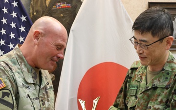 Japanese officer presents gift to FCOE CG