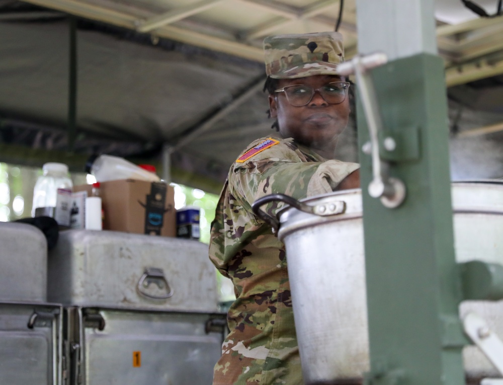 Maryland Army National Guard Soldier cooking for Region II Best Warrior Competitors