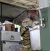 Maryland Army National Guard Soldier cooking for Region II Best Warrior Competitors