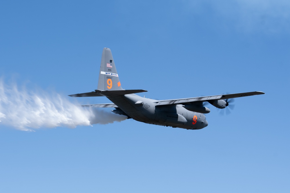 A C-130 (MAFFS 9) from Nevada Air National Guard's 152nd Airlift Wing performs a water drop May 8, 2024, during Modular Airborne Fire Fighting System (MAFFS) Spring Training 2024