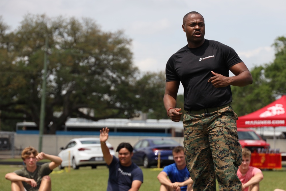 U.S. Marines Conduct The Glazier Clinics CFT Event With Erath High School Football Players