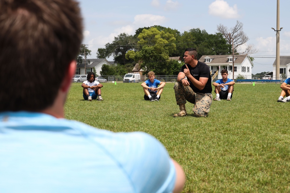 U.S. Marines Conduct The Glazier Clinics CFT Event With Erath High School Football Players