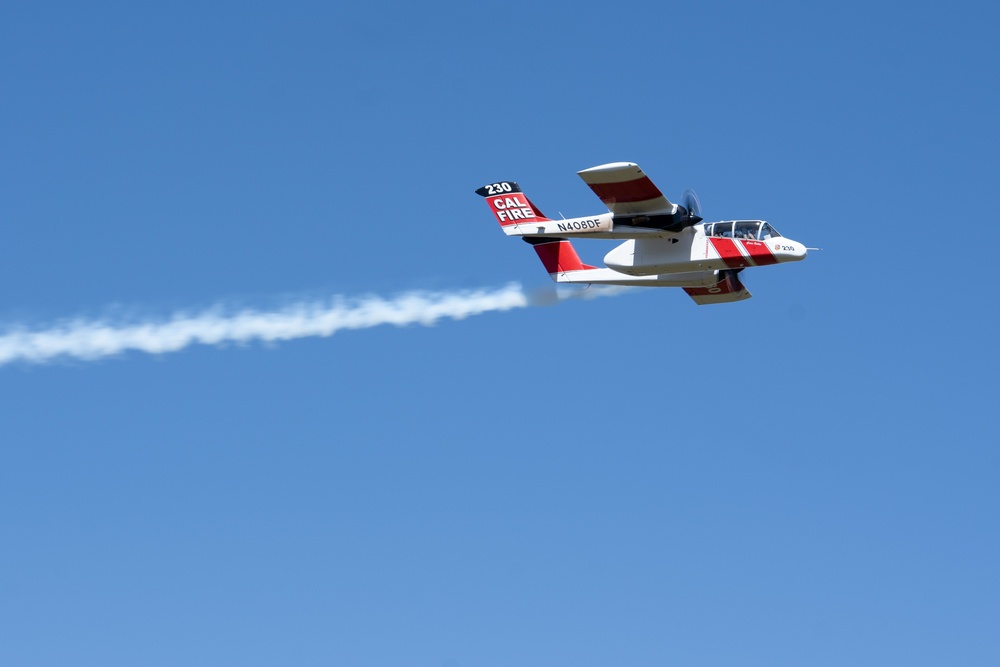 U.S. Forest Service Lead Plane dispenses a puff of smoke during Modular Airborne Fire Fighting System (MAFFS) Spring Training May 8, 2024