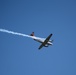 U.S. Forest Service Lead Aircraft dispenses a puff of smoke during Modular Airborne Fire Fighting System (MAFFS) Spring Training 2024