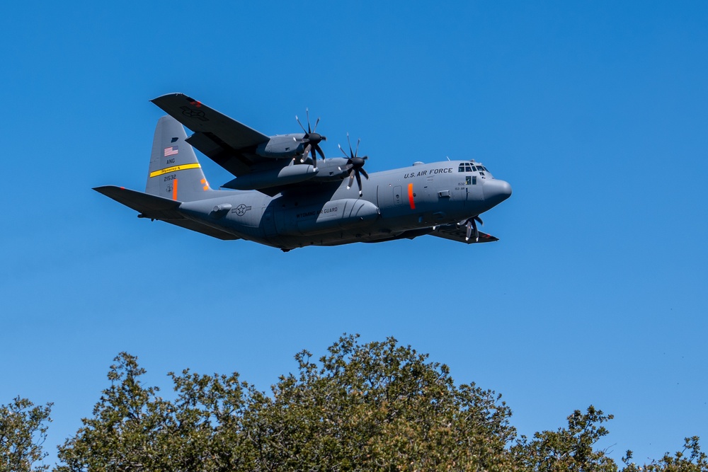 A C-130 from Wyoming Air National Guard's 153rd Airlift Wing does a dry pass during Modular Airborne Fire Fighting System (MAFFS) Spring Training 2024