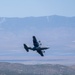 A C-130 from Wyoming Air National Guard's 153rd Airlift Wing does a dry pass prior to performing a water drop during Modular Airborne Fire Fighting System (MAFFS) Spring Training 2024