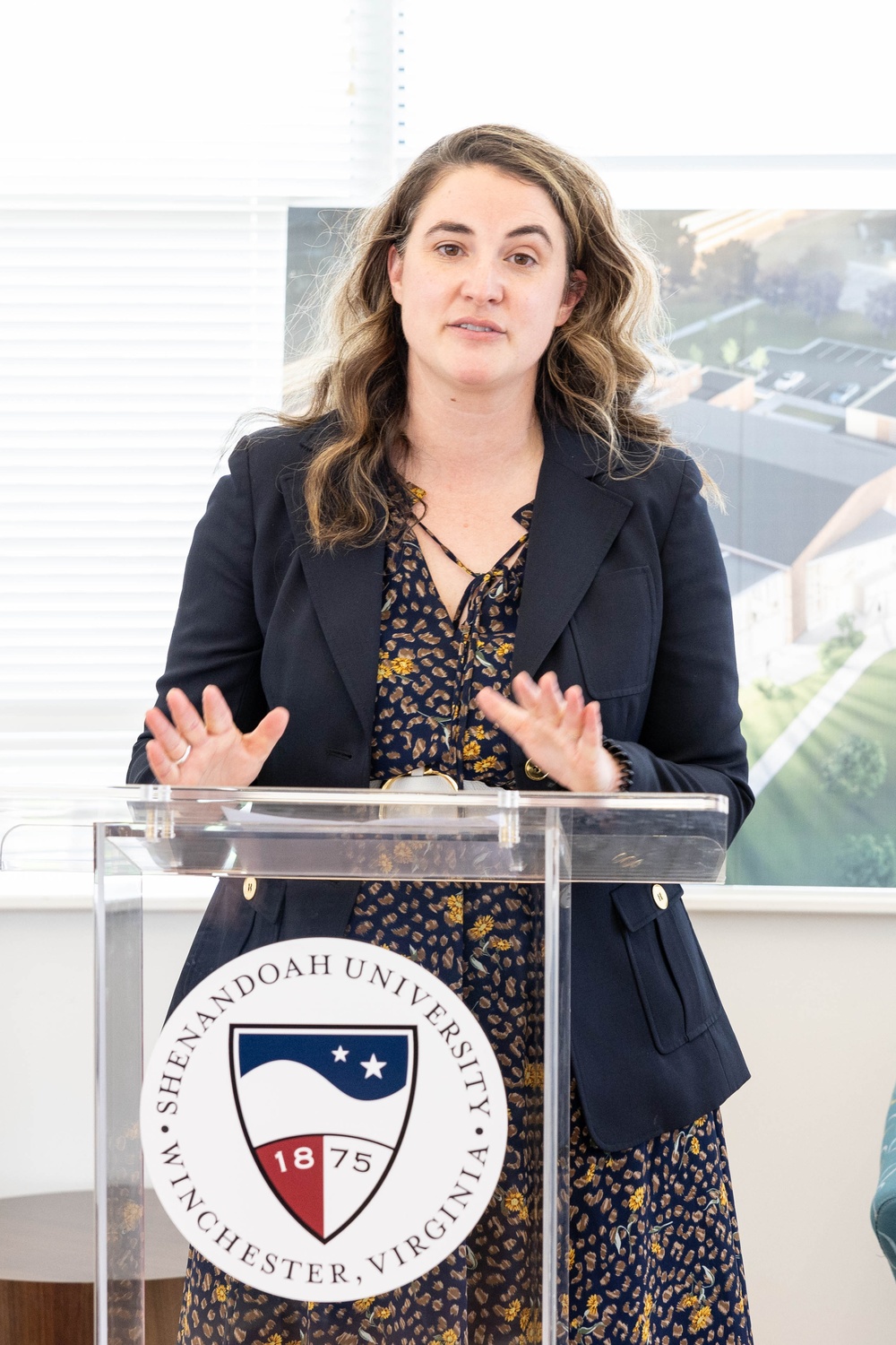 Mary Ensogna speaks at signing ceremony between TAM and Shenandoah University