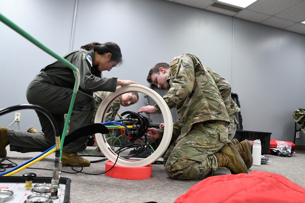 354th Medical Group and 168th Operations collaborate on Hyperlite Hyperbaric stretcher training