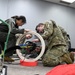 354th Medical Group and 168th Operations collaborate on Hyperlite Hyperbaric stretcher training