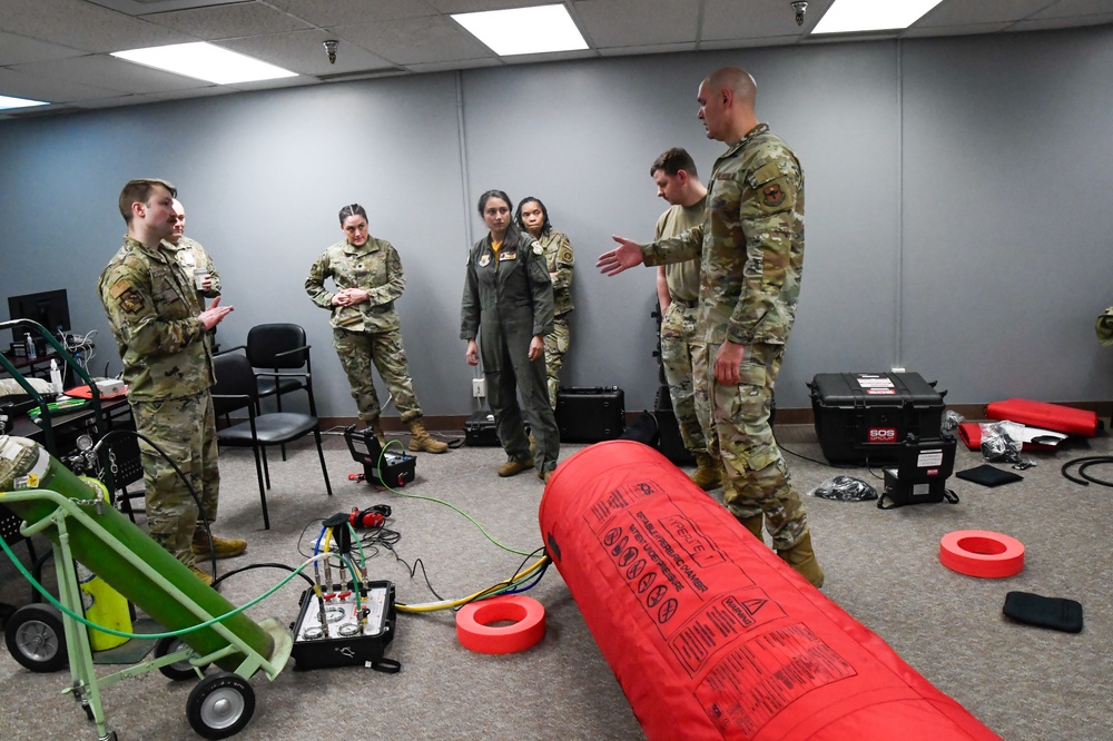 354th Medical Group and 168th Operations collaborate on Hyperlite Hyperbaric stretcher training