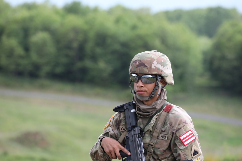 D.C. National Guard Soldier waits to qualify on M249 during Region II Best Warrior Competition