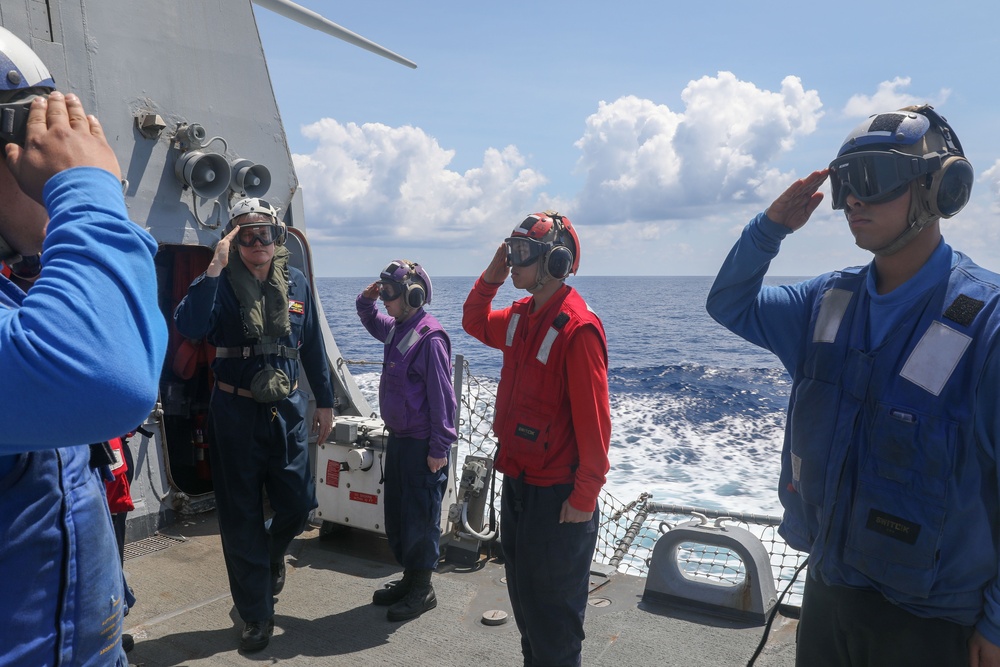 Rear Adm. Christopher Alexander, commander of Carrier Strike Group 9, visits the USS Howard in the South China Sea