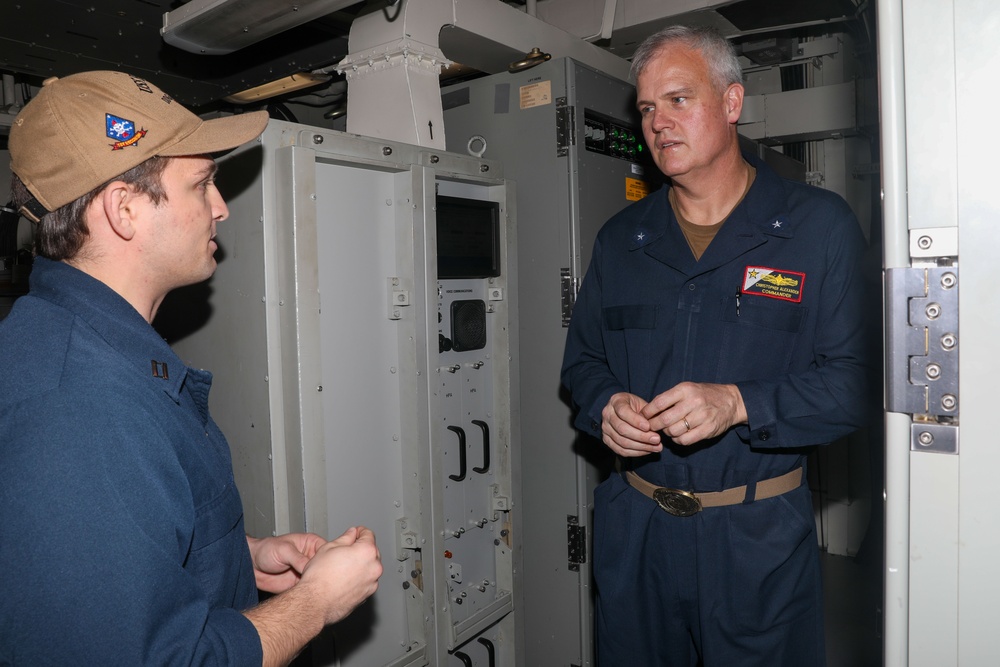 Rear Adm. Christopher Alexander, commander of Carrier Strike Group 9, visits the USS Howard in the South China Sea