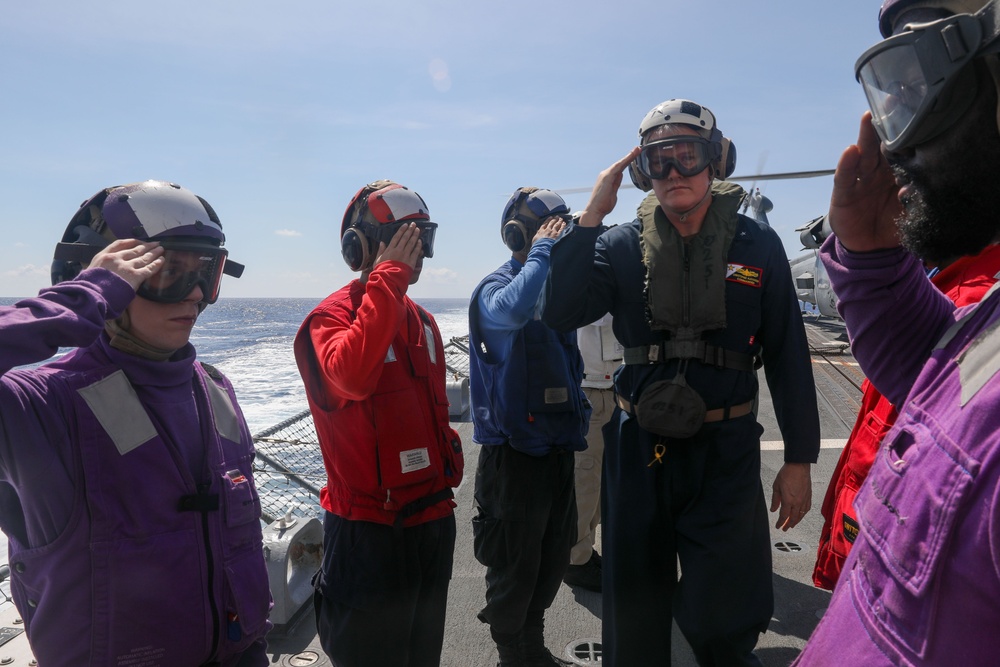 Rear Adm. Christopher Alexander, commander of Carrier Strike Group 9, visits the USS Howard in the South China Sea