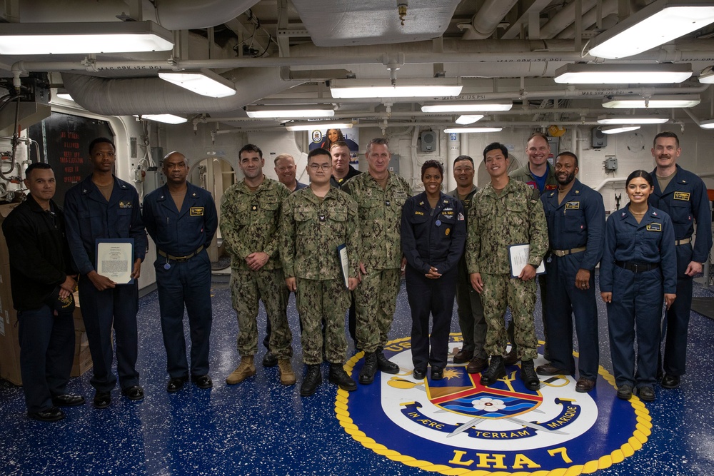 USS Tripoli Sailors Receive Hard Charger of the Month Award