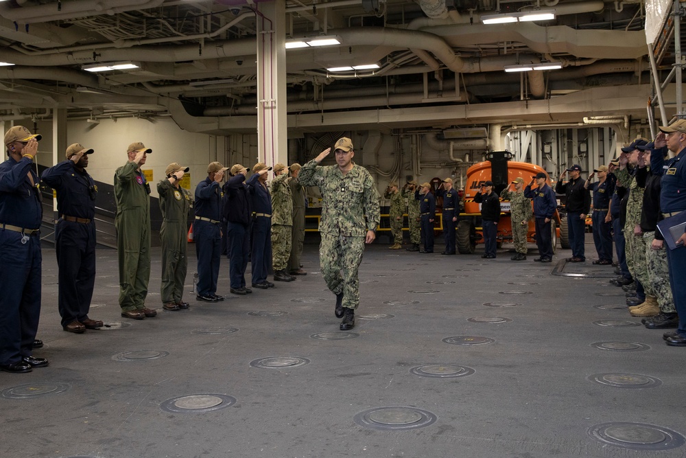 USS Tripoli Sailors are Piped Ashore