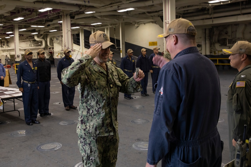 USS Tripoli Sailors are Piped Ashore