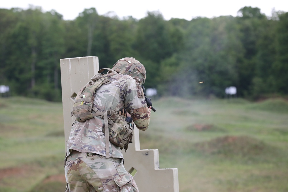 A U.S. Army National Guard Soldier fires during the M4 carbine qualification course event at Region II Best Warrior Competition