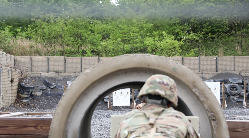 U.S. Army National Guard Soldier fires during the M4 carbine qualification course