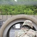 U.S. Army National Guard Soldier fires during the M4 carbine qualification course