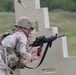 Virginia Army National Guard Soldier changes magazine during Region II Best Warrior Competition