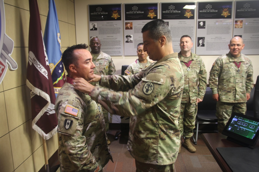 Army Officer Inducted into Prestigious Medical Order