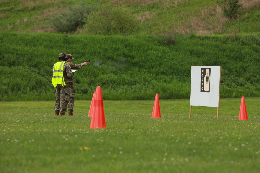 Competitor Fires Pistol during Combat Pistol Qualification Course