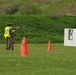Competitor Fires Pistol during Combat Pistol Qualification Course