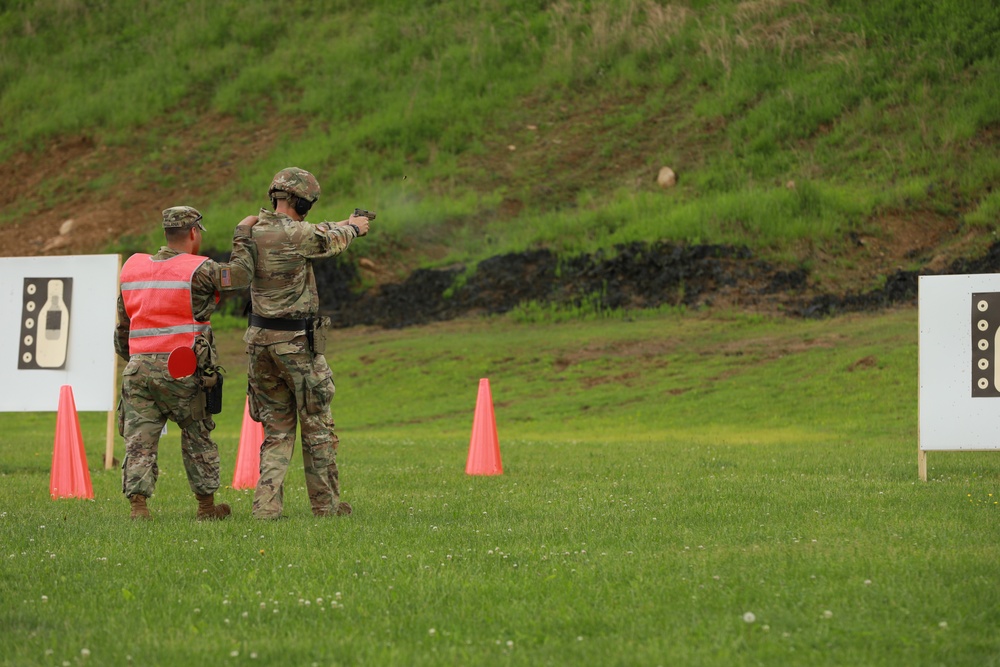 A Competitor Fires Pistols During Region II Best Warrior Competition 2024
