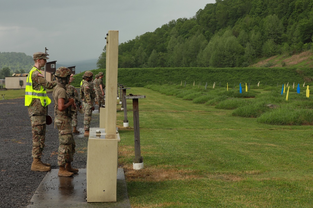 Competitors Fire Pistols during Combat Pistol Qualification Course as part of Region II Best Warrior Competition