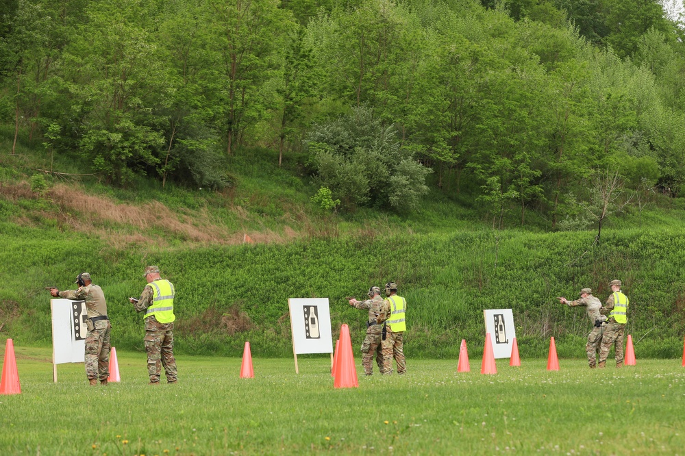 Competitors Fire Pistols during Region II Best Warrior Competition