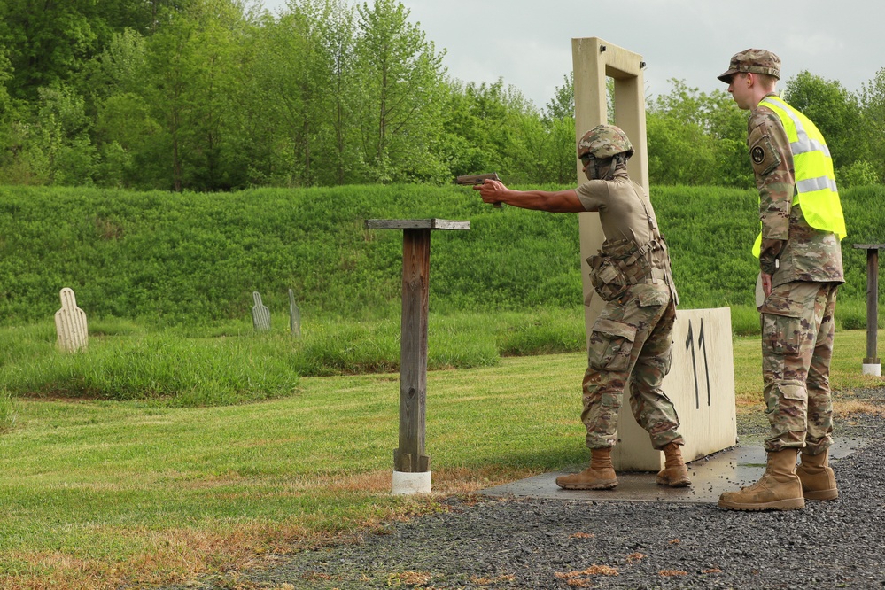 Delaware Army National Guardsman Fires Pistol during Combat Pistol Qualification Course