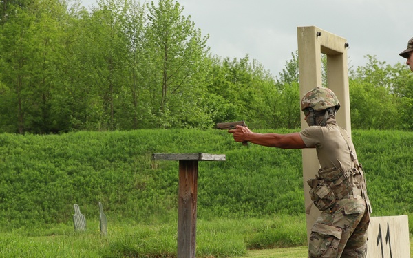 Delaware Army National Guardsman Fires Pistol during Combat Pistol Qualification Course