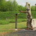 Delaware Army National Guardsman Fires Pistol during Combat Pistol Qualification Course