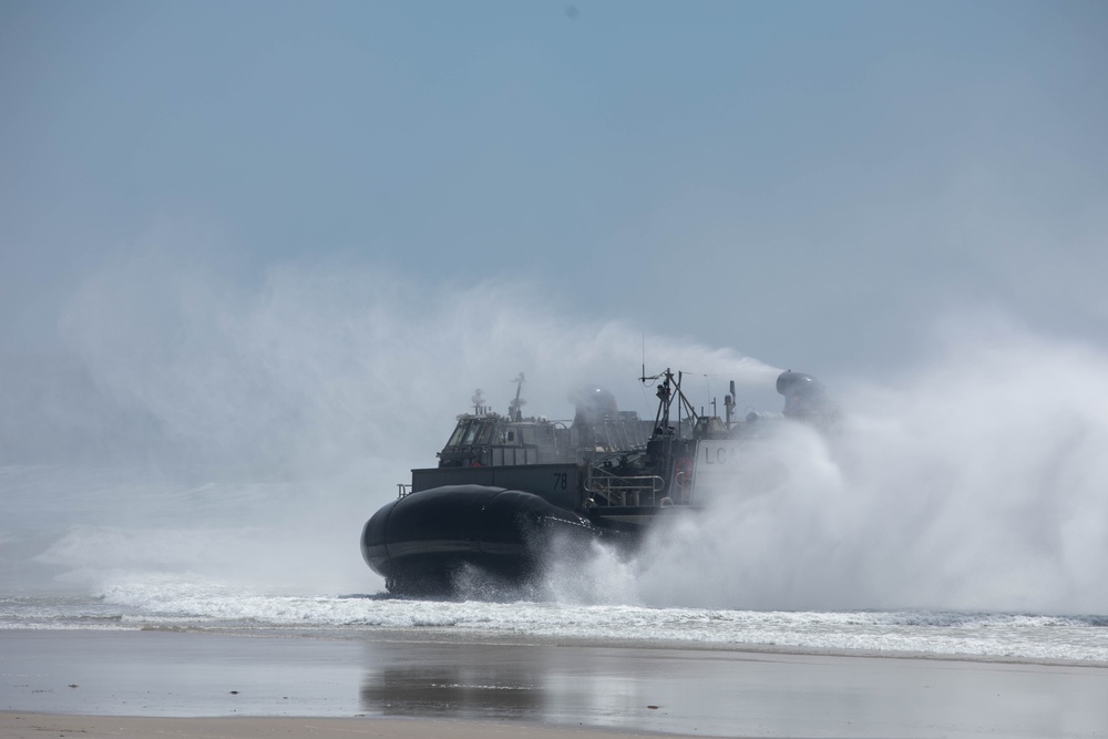 1st LAR Bn. offloads from LCACs during reconnaissance field exercise