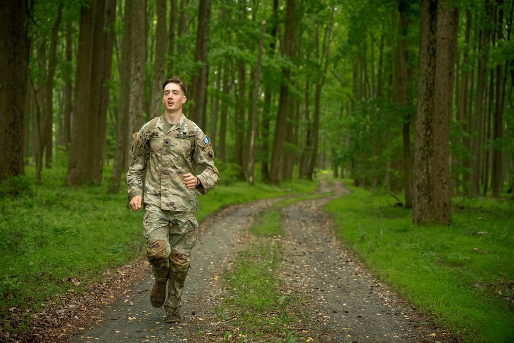 Spc. Cooper runs during Region 2 Best Warrior Competition Valor Run