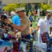 U.S. Marines and Sailors pass out toys during a community outreach event at Nicklaus Children’s Hospital as part of Fleet Week Miami on May 9, 2024.