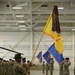Soldiers present arms during the colors casing ceremony